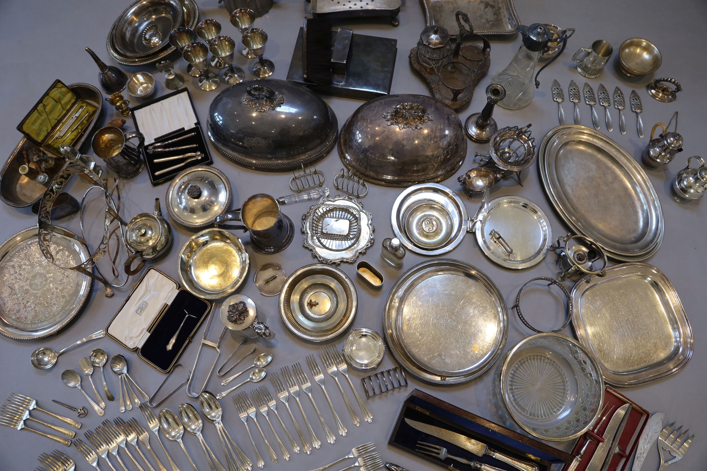 A collection of assorted plated wares,